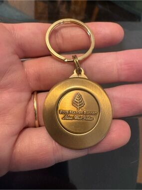 The Four Seasons Hotel Brass color Key Chain